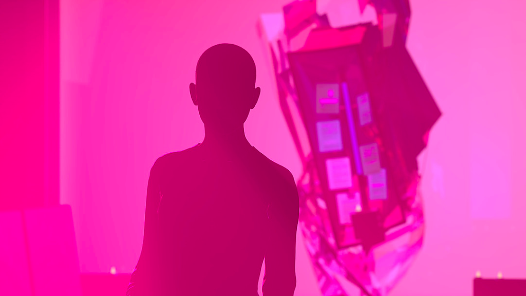 This image is hot pink and features a person's silhouette against a background image of an unidentified object.