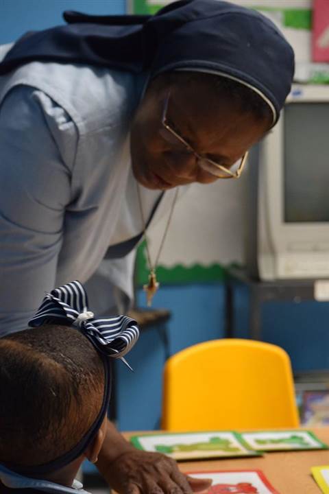 Sister Gertrude shares a word of encouragement to the young at St. Benedict's Nursery