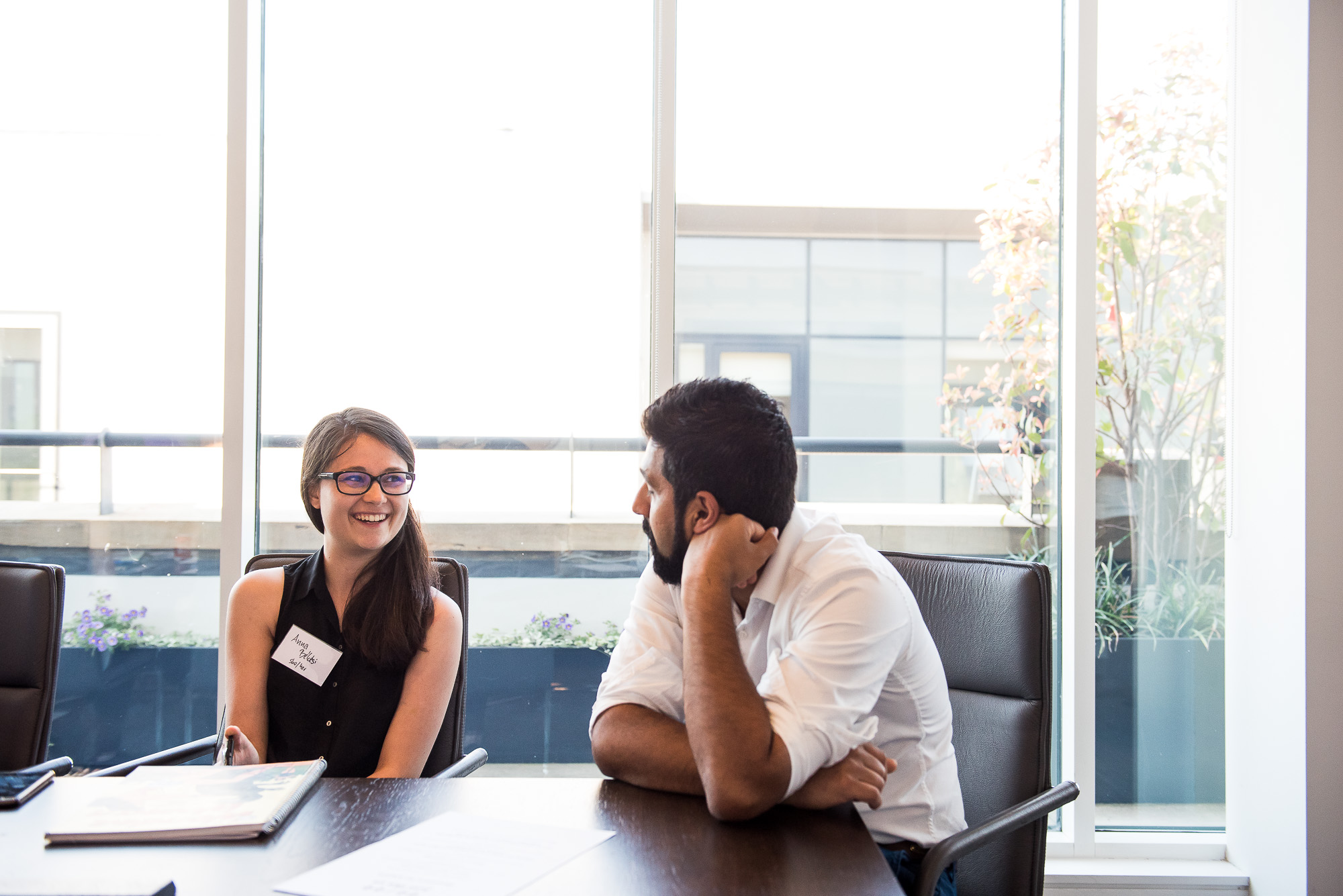 Student in conversation with a professional
