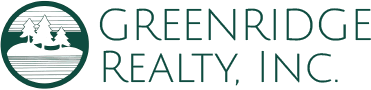 Greenridge Realty Logo. Green text with a logo of a forest scene.