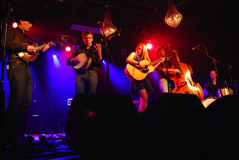 image of the band Thunder & Rain on stage