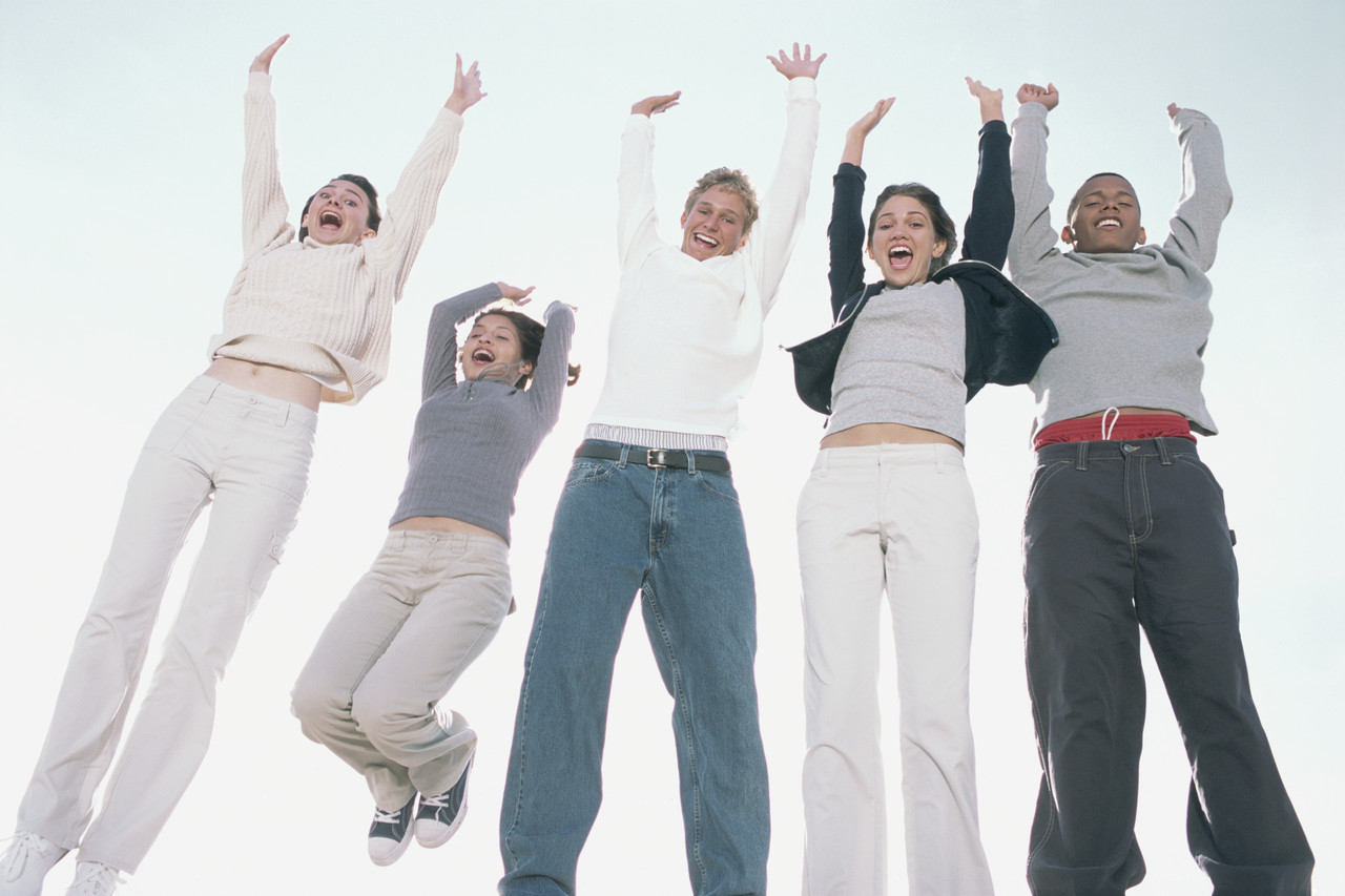 Teens jumping for joy