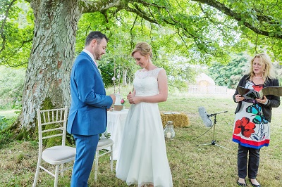 Couple getting married under the sycamore tree