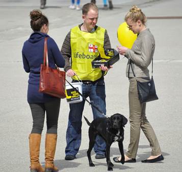 Volunteer talking to supporters